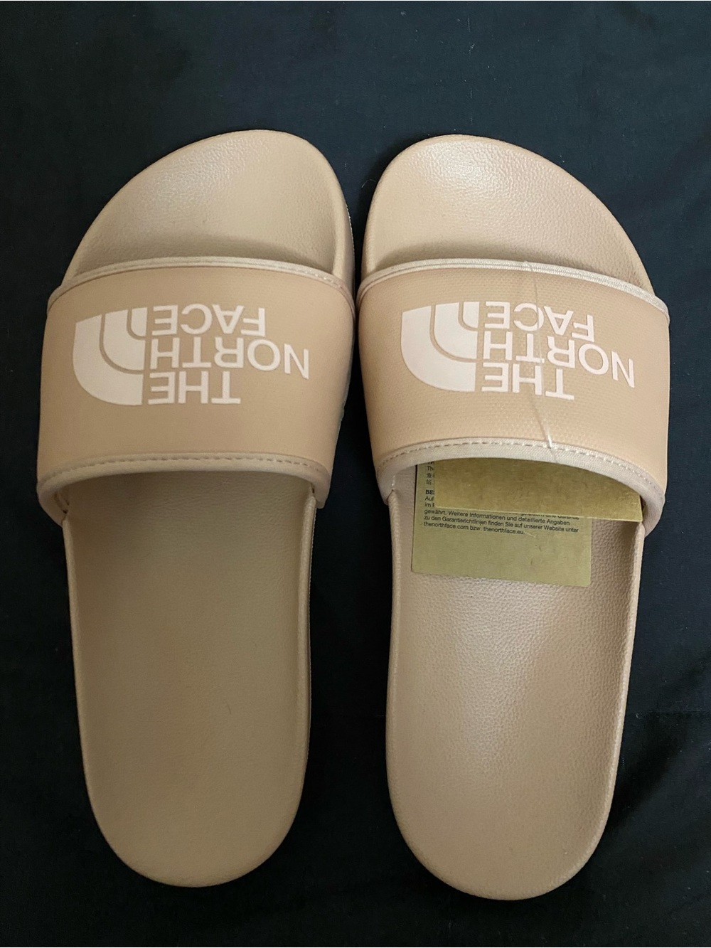The North Face Tan Slide Sandals with Logo Strap in Dusty Rose Blush Pink